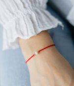 Bratara martisor cu doua bilute din aur14 k, miyuki rosu si perla de cultura M11