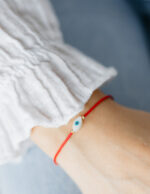 Bratara martisor cu doua bilute din aur 14k si ochisor norocos din sidef M12