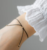 Bratara cu 3 bilute aur 14k pe snur negru - imagine 3