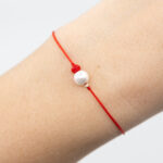 Bratara martisor cu o biluta aur 14k si perla de scoica M28